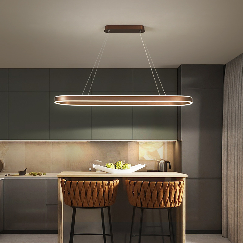 Lampa_Wisz_ca_w_Kolorze_R_owego_Z_ota_Metalowe_Wyko_czenie_O_wietlenie_LED_ze_ciemnianiem_nad_St_i_Wysp_Kuchenn_1.png