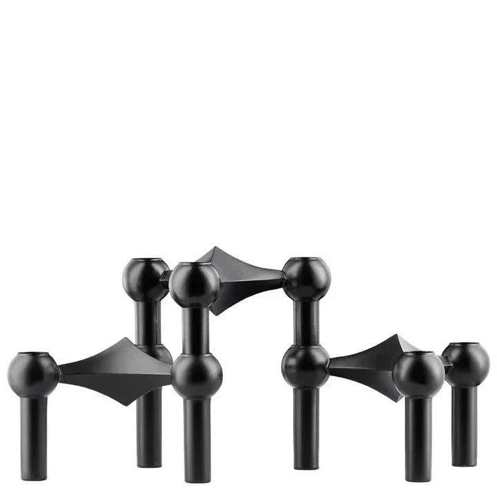 Modułowy świecznik metalowy o geometrycznej formie