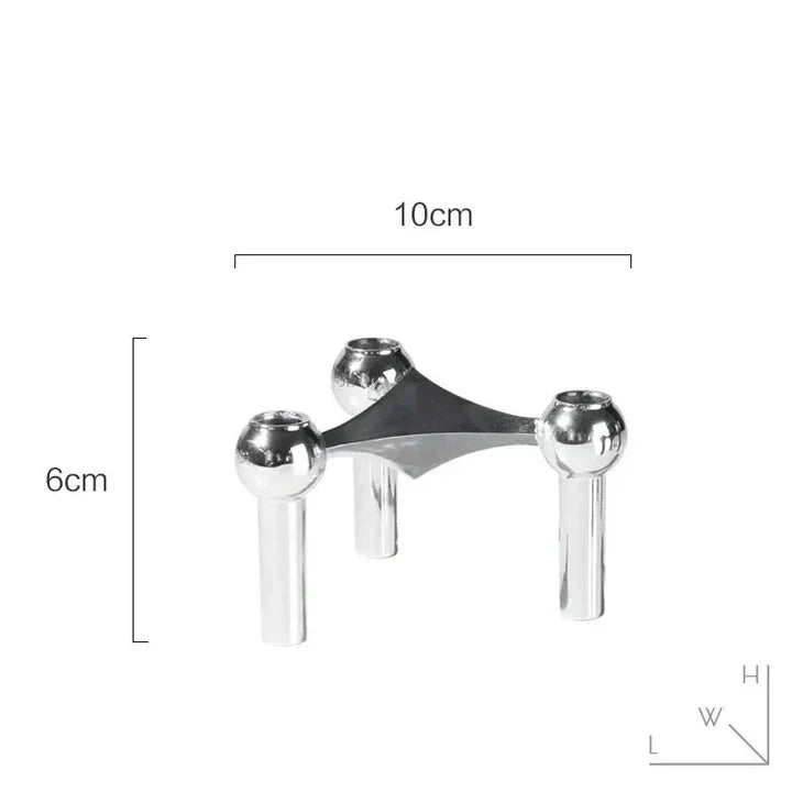 Modułowy świecznik metalowy o geometrycznej formie