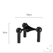 Modułowy świecznik metalowy o geometrycznej formie
