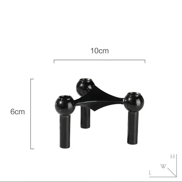 Modułowy świecznik metalowy o geometrycznej formie